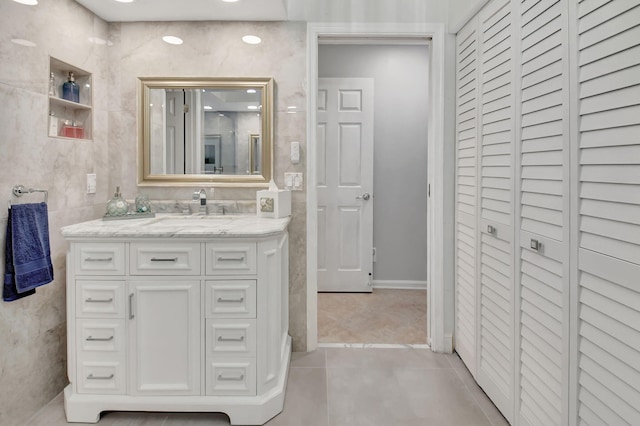 bathroom featuring tile patterned floors and vanity