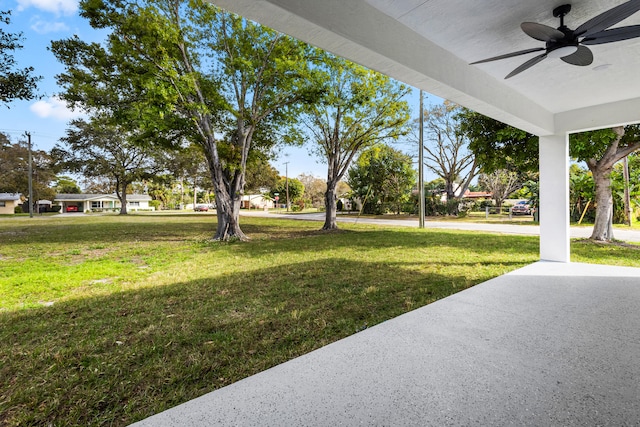 view of yard featuring ceiling fan