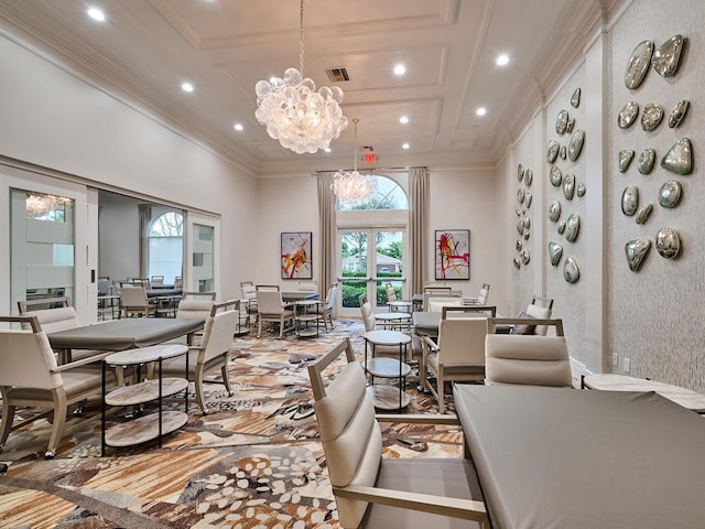 interior space featuring ornamental molding, coffered ceiling, a notable chandelier, and french doors