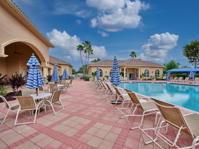 view of swimming pool featuring a patio area