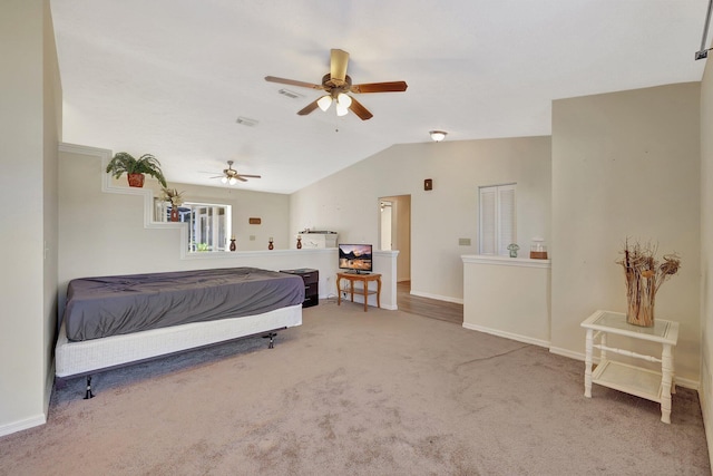 bedroom featuring carpet floors, ceiling fan, and vaulted ceiling