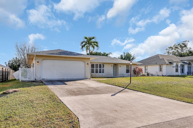 single story home with a garage and a front yard