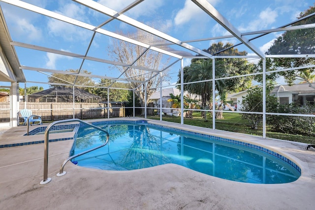 view of pool featuring a lanai and a patio area