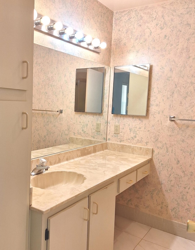 bathroom with vanity and tile patterned flooring