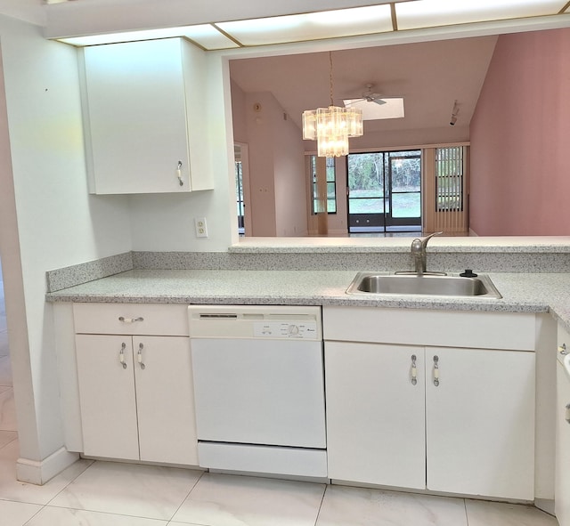 kitchen with white cabinetry, sink, hanging light fixtures, and dishwasher