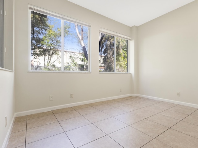 view of tiled spare room