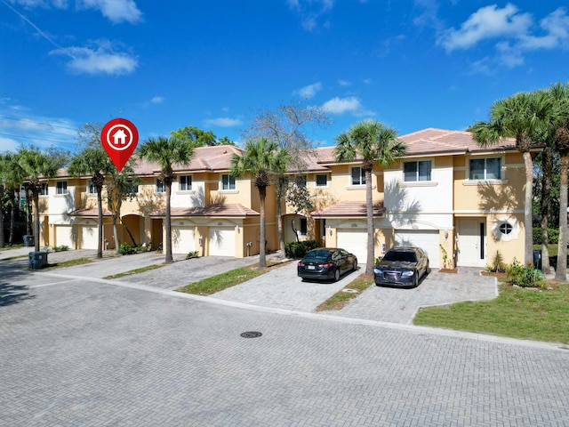 view of property featuring a garage