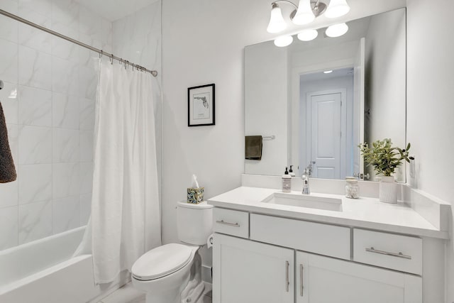 full bathroom featuring shower / bath combo, vanity, and toilet