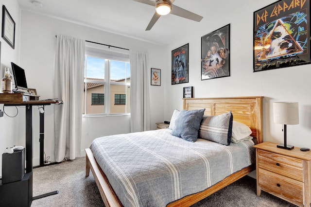 bedroom with ceiling fan and carpet