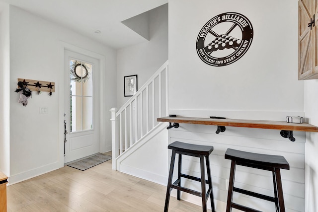 foyer entrance featuring light hardwood / wood-style flooring