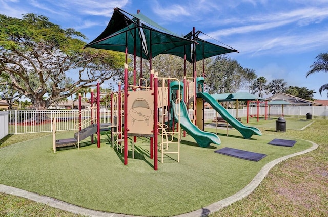 view of jungle gym featuring a yard