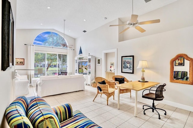 tiled living room with ceiling fan, high vaulted ceiling, and a textured ceiling