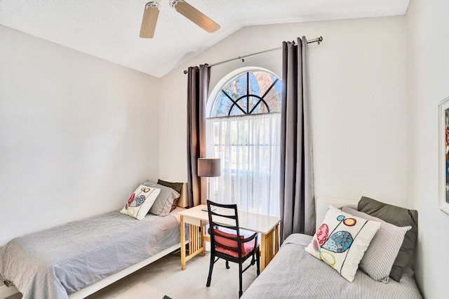 bedroom featuring vaulted ceiling and ceiling fan