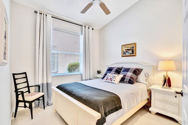 bedroom featuring vaulted ceiling and ceiling fan