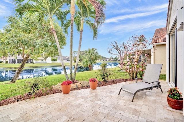 view of patio featuring a water view