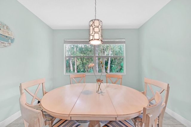 view of tiled dining space