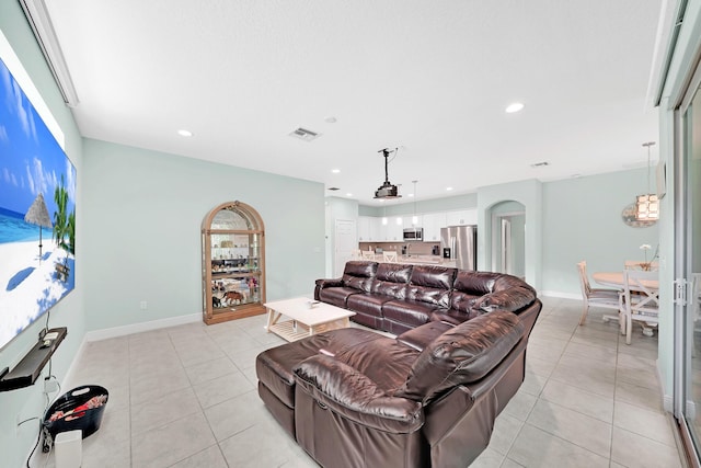 living room with light tile patterned floors