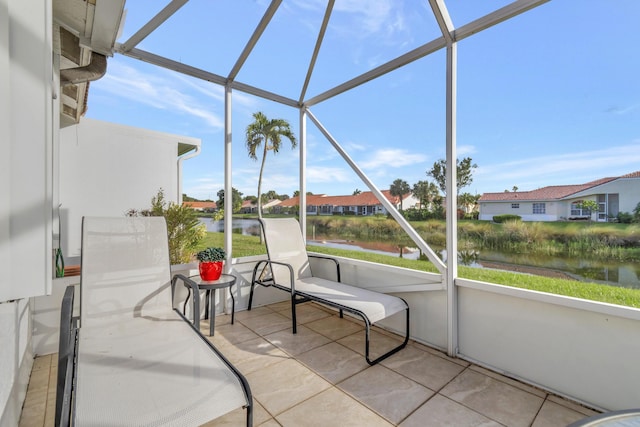 sunroom with a water view