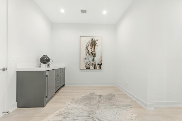 hall featuring light hardwood / wood-style floors