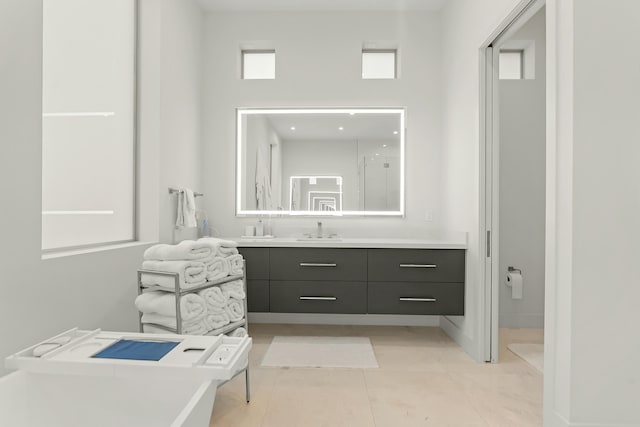 bathroom featuring vanity and tile patterned flooring