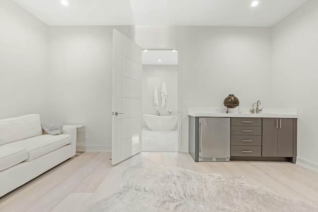 bathroom featuring vanity and a bathing tub