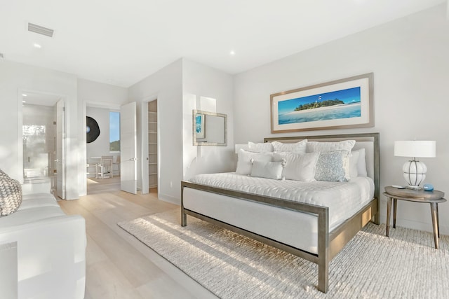 bedroom featuring light hardwood / wood-style floors