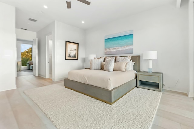 bedroom featuring light hardwood / wood-style floors and ceiling fan