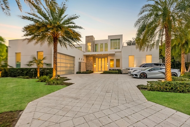 view of front of home with a lawn