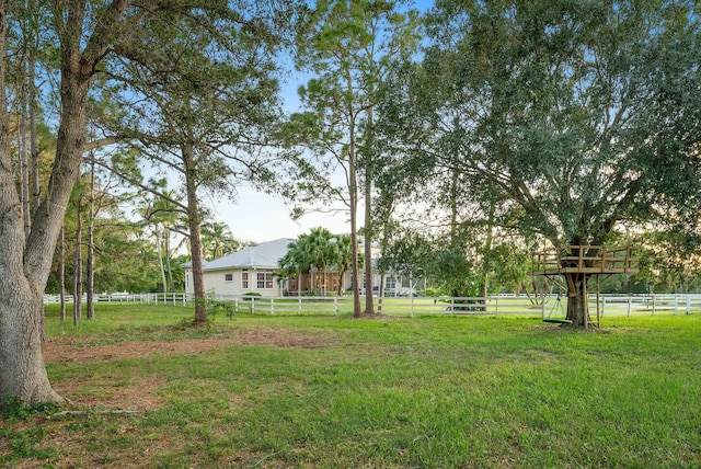 view of yard featuring fence