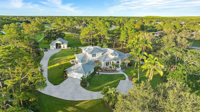 aerial view featuring a forest view