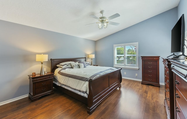 bedroom featuring vaulted ceiling, ceiling fan, and dark hardwood / wood-style flooring