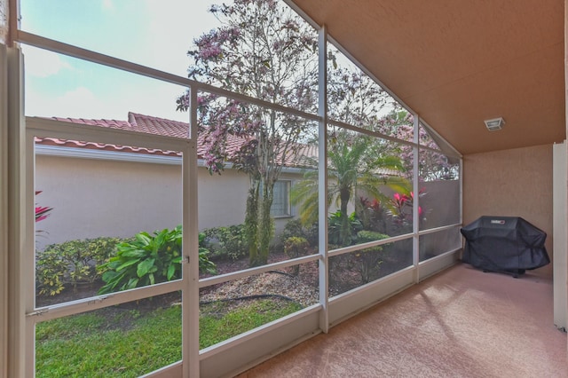 unfurnished sunroom with a healthy amount of sunlight