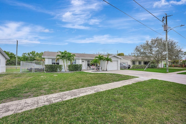 single story home with a garage and a front lawn