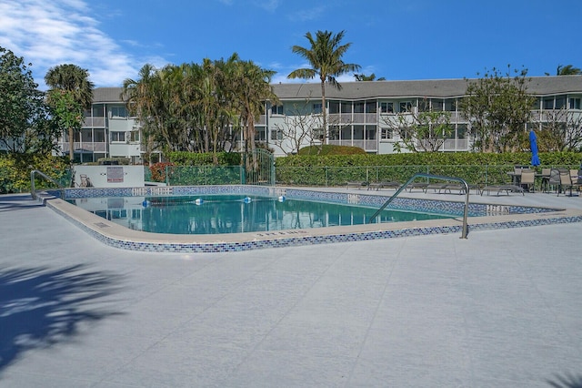 community pool with fence