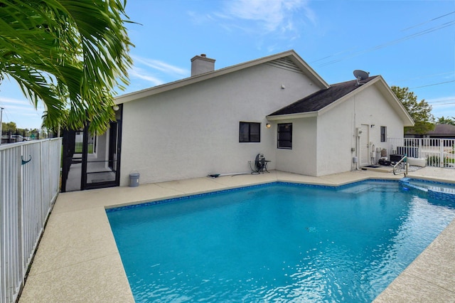 view of pool with a patio area