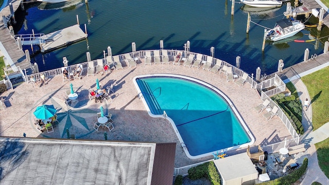 view of pool featuring a water view