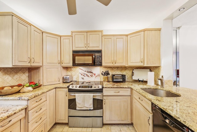 kitchen featuring tasteful backsplash, sink, black appliances, light stone countertops, and light brown cabinets