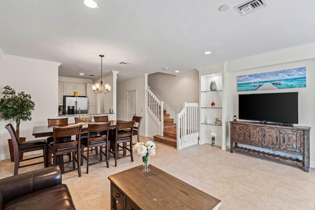 tiled living room featuring ornamental molding and a chandelier