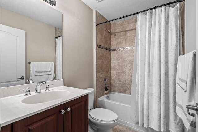 full bathroom with vanity, toilet, a textured ceiling, and shower / bath combo with shower curtain