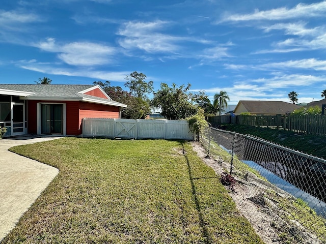 view of yard with a fenced backyard and a patio