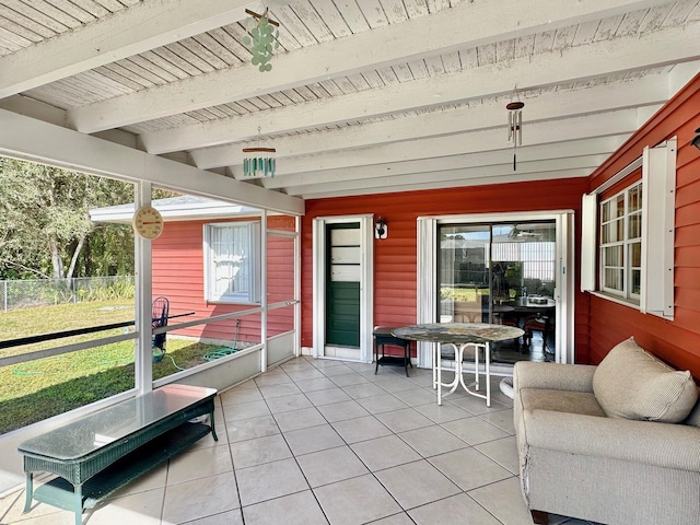 sunroom / solarium with beamed ceiling and wood ceiling