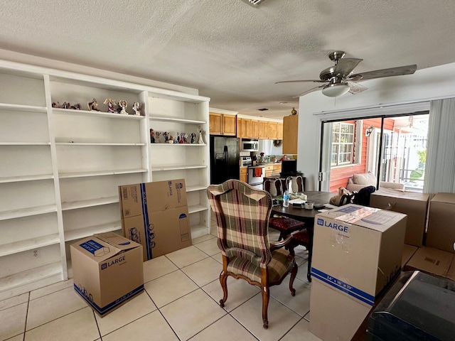 storage area featuring a ceiling fan