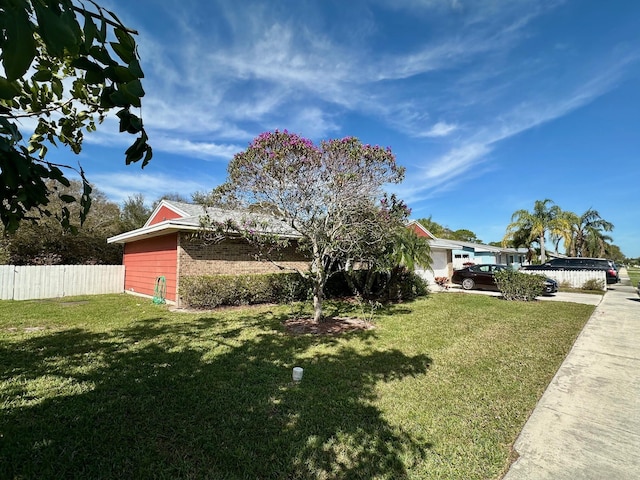 view of yard featuring fence