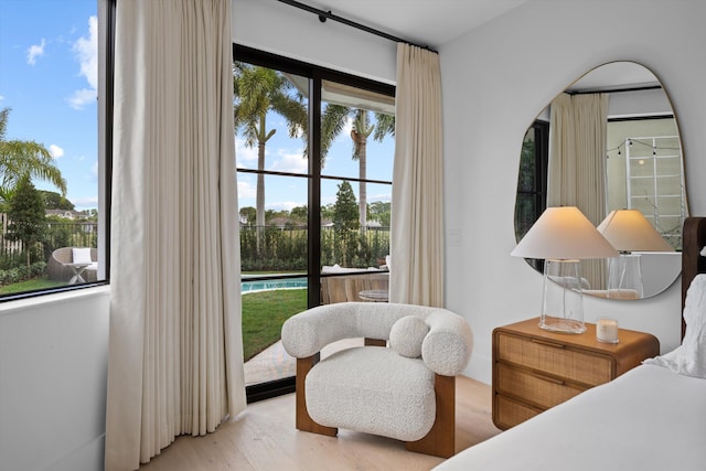 2578 Players Ct, Wellington, FL 33414 - bedroom featuring access to exterior and light hardwood / wood-style flooring