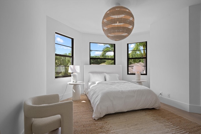 2578 Players Ct, Wellington, FL 33414 - bedroom featuring multiple windows and hardwood / wood-style flooring