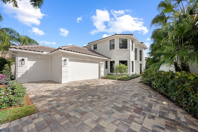 2578 Players Ct, Wellington, FL 33414 - mediterranean / spanish house with a garage