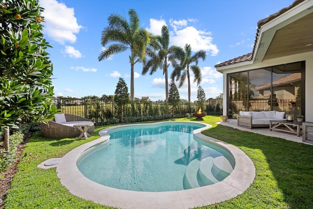 2578 Players Ct, Wellington, FL 33414 - view of swimming pool with a lawn, outdoor lounge area, and a patio