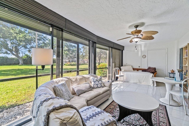 sunroom / solarium with ceiling fan