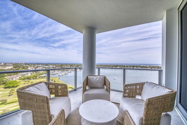 balcony featuring a water view