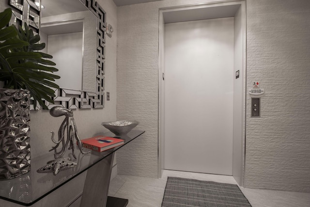 bathroom featuring elevator